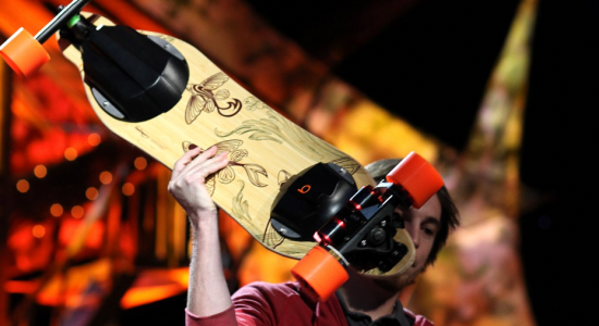 electric-skateboard-holding electric-skateboard-holding